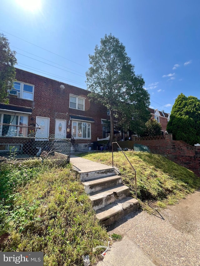 view of front of house featuring a patio