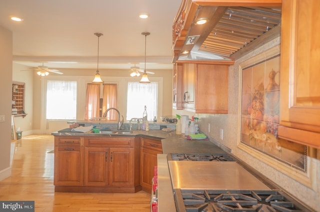 kitchen with wooden ceiling, sink, vaulted ceiling with beams, ceiling fan, and light wood-type flooring