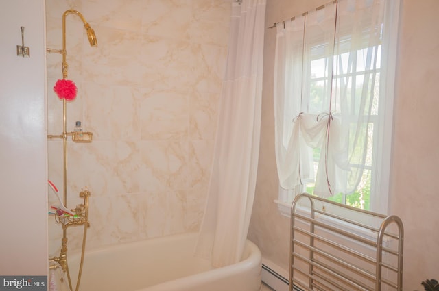 bathroom featuring baseboard heating, a wealth of natural light, and shower / bath combo with shower curtain