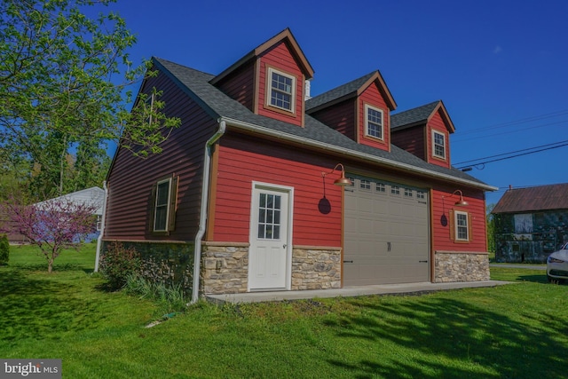 exterior space with a front lawn and a garage