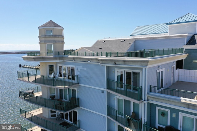 view of building exterior featuring a water view