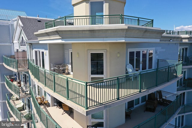 exterior space featuring a balcony