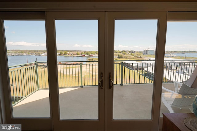 sunroom with a water view