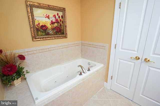 bathroom featuring tile floors and tiled bath