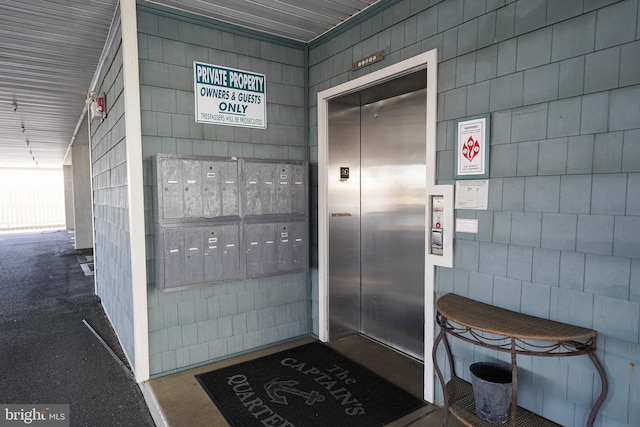 view of exterior entry with elevator