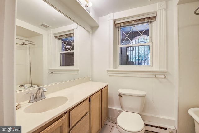 bathroom featuring a baseboard heating unit, tile patterned floors, a shower, toilet, and vanity