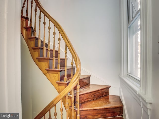 staircase with a healthy amount of sunlight