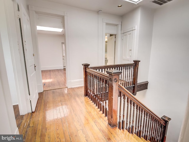 hall featuring wood-type flooring