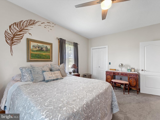 bedroom featuring carpet flooring, ceiling fan, and a closet