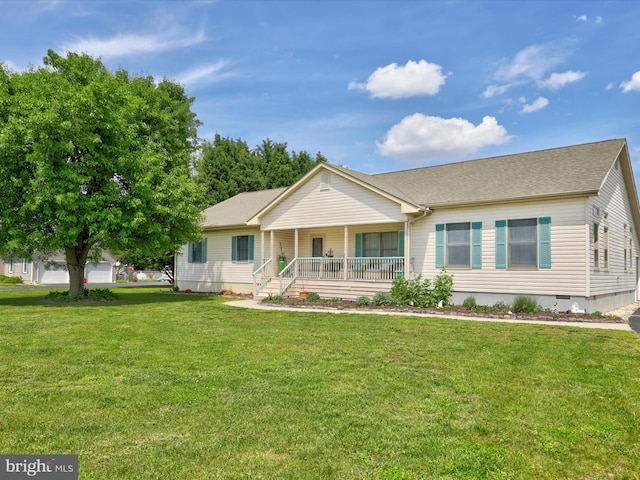 ranch-style house with covered porch and a front lawn