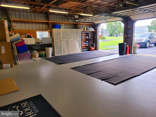 garage featuring a garage door opener