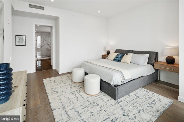 bedroom featuring dark wood-type flooring