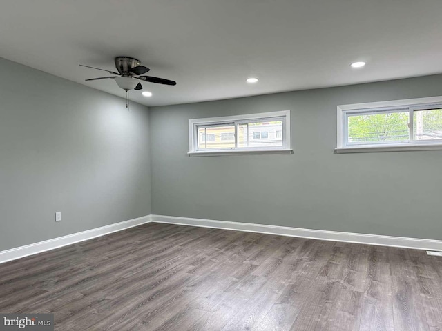 unfurnished room with wood-type flooring and ceiling fan