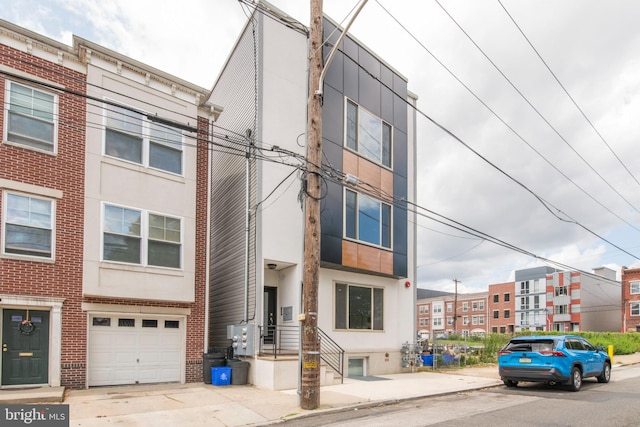 view of building exterior with a garage