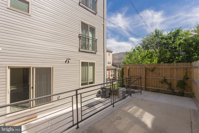 view of patio with central AC unit