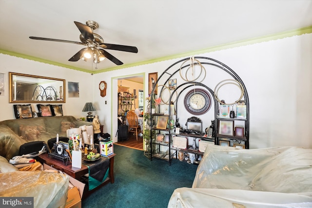 carpeted living room with ceiling fan and crown molding