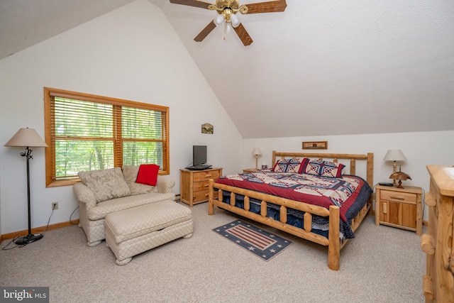 bedroom with lofted ceiling, ceiling fan, and carpet floors