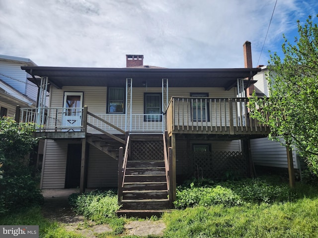 back of house with covered porch