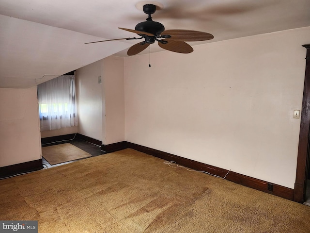 additional living space with carpet, ceiling fan, and lofted ceiling