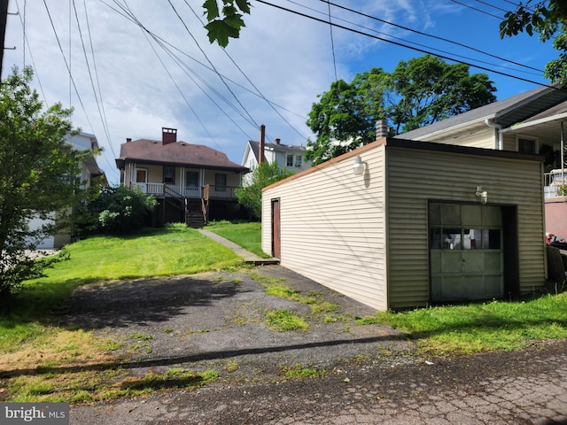 garage with a lawn