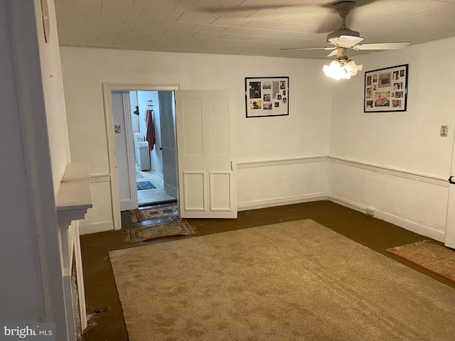 unfurnished room featuring dark hardwood / wood-style flooring and ceiling fan