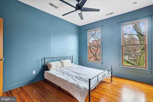 bedroom featuring ceiling fan and light wood-type flooring