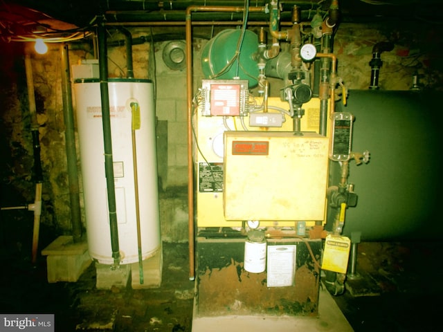 utility room featuring gas water heater