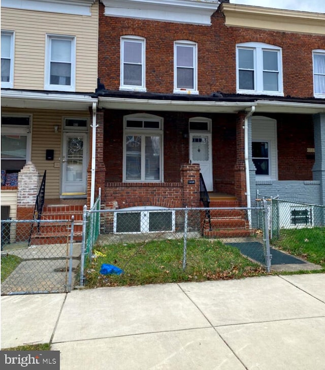 multi unit property featuring covered porch