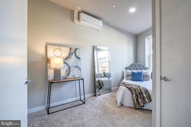 sitting room with a wall unit AC and carpet