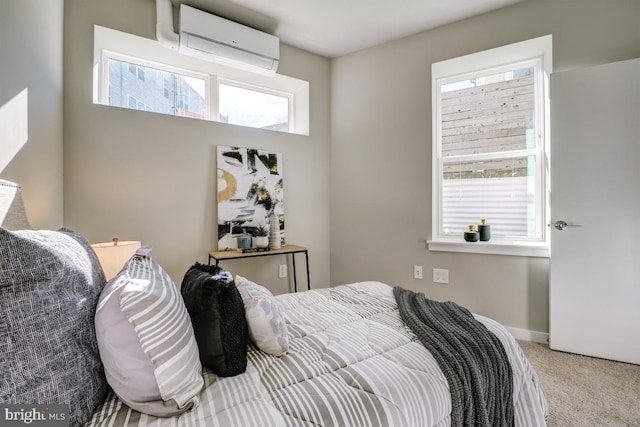 bedroom featuring carpet and a wall unit AC