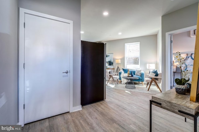 hallway featuring hardwood / wood-style floors