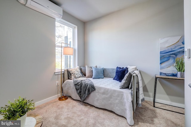 carpeted bedroom featuring a wall unit AC