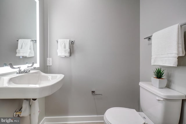 bathroom featuring toilet