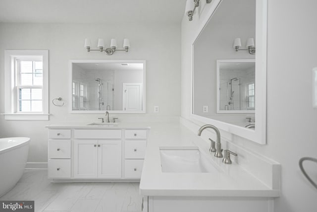 bathroom featuring tile flooring, a shower with door, and dual bowl vanity