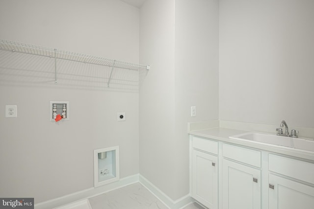 laundry room with washer hookup, electric dryer hookup, light tile floors, and sink