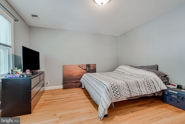 bedroom featuring light hardwood / wood-style floors