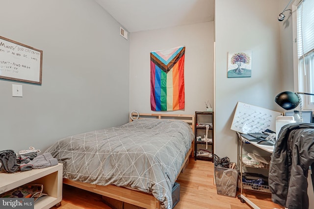 bedroom featuring light wood-type flooring