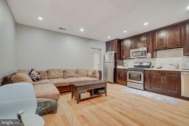 living room featuring light hardwood / wood-style floors