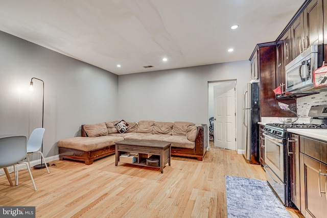 living room featuring light wood-type flooring