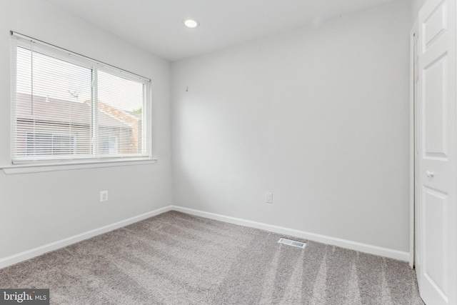 view of carpeted spare room