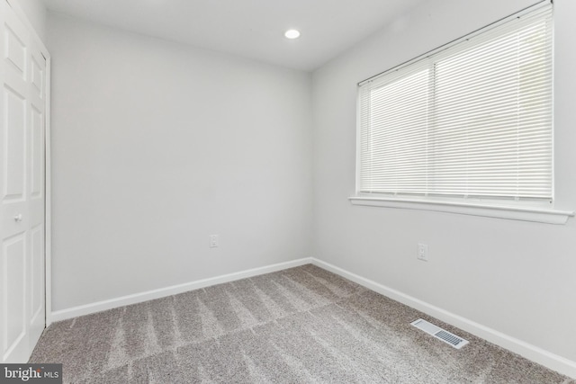 unfurnished bedroom featuring carpet flooring