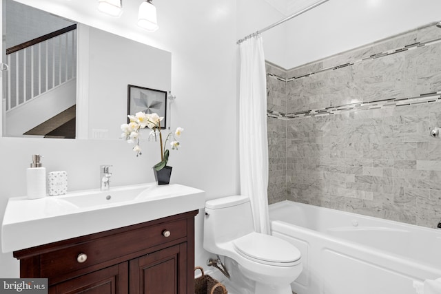 full bathroom featuring vanity, toilet, and shower / bathtub combination with curtain