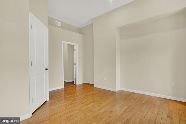 unfurnished room featuring light hardwood / wood-style floors