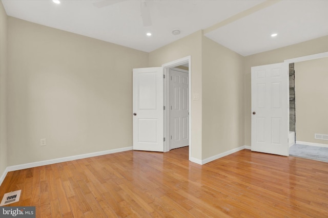 unfurnished bedroom featuring ceiling fan and light wood-type flooring