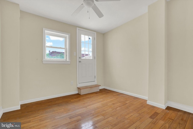 unfurnished room featuring light hardwood / wood-style floors and ceiling fan