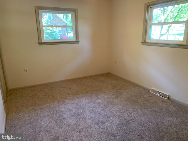 view of carpeted spare room