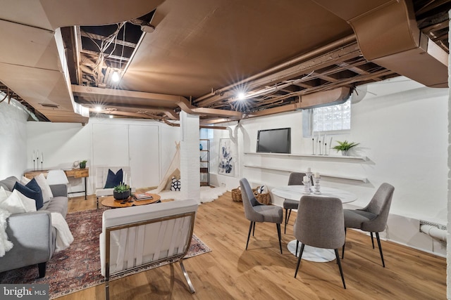 basement with wood-type flooring