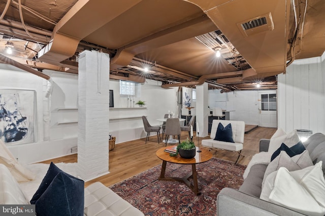 living room with hardwood / wood-style flooring