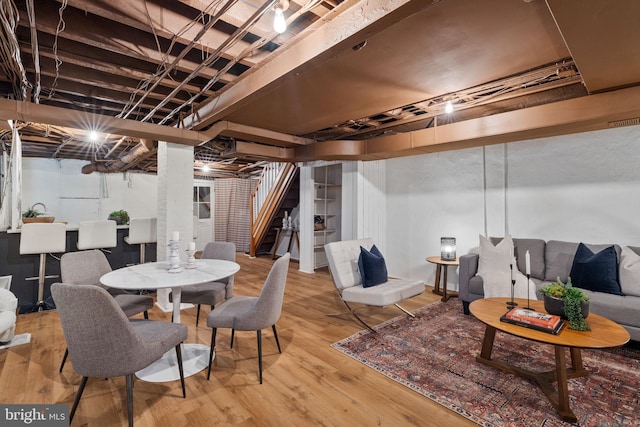 basement featuring wood-type flooring