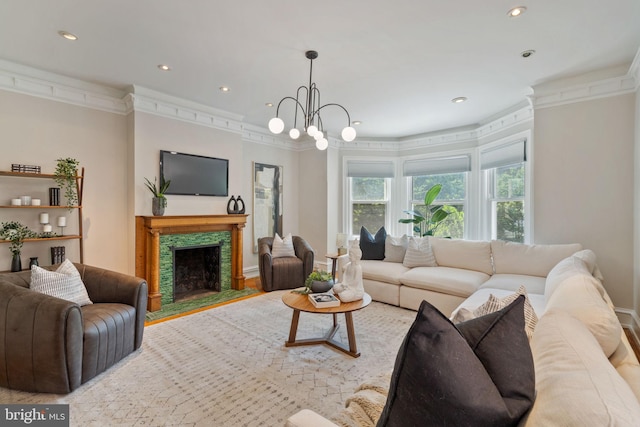 living room with crown molding and a notable chandelier